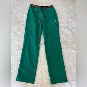 EON by Maevn green scrub pants.